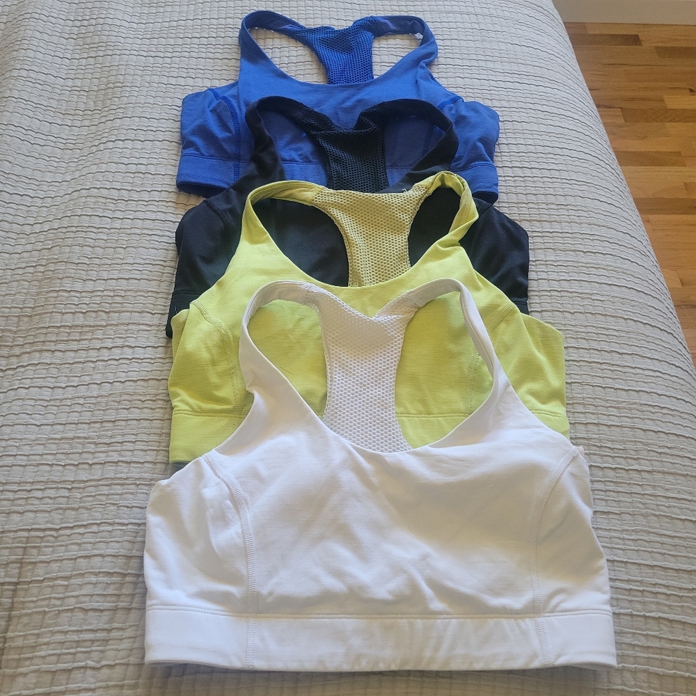 Set of Four Sports Bras in White, Yellow, Black, and Blue